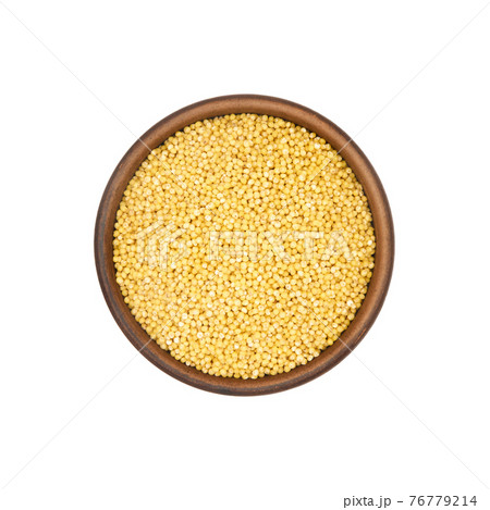 red millet in clay bowl isolated on white background, top view 76779214