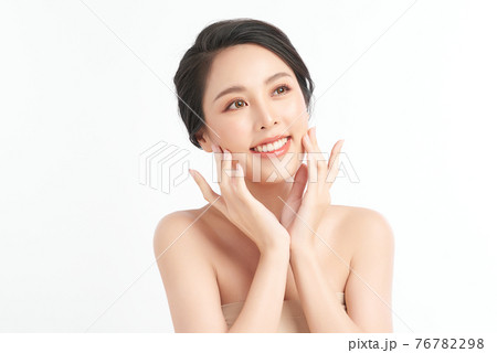 Beautiful young asian woman with clean fresh skin on white background, Face care, Facial treatment, 76782298