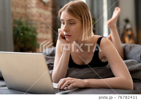 Woman working at home Woman working at home 76782431
