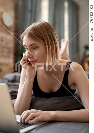 Girl working on laptop Girl working on laptop 76782432