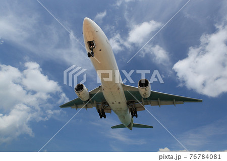 Big white airplane is flying over the clouds with colorful sky at sunset for Business trip with Commercial plane, Transportation, import-export and logistics, Travel concept , Airplane is flying for Big white airplane is flying over the clouds with colorful sky at sunset for Business trip with Commercial plane, Transportation, import-export and logistics, Travel concept , Airplane is flying for 76784081