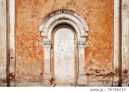The classic facade closed the entrance to an old merchant's house in Torzhka, Russia 76788224