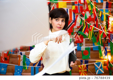 Woman secretary throws papers into the air Woman secretary throws papers into the air 76788439