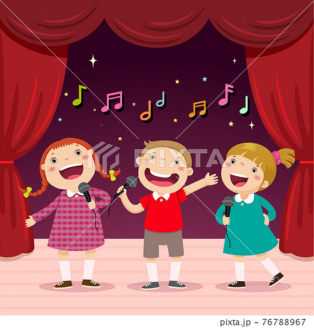 Children sing with a microphone on the stage 76788967