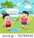 Thai kids splashing water in Songkran festival at the temple. 76789046