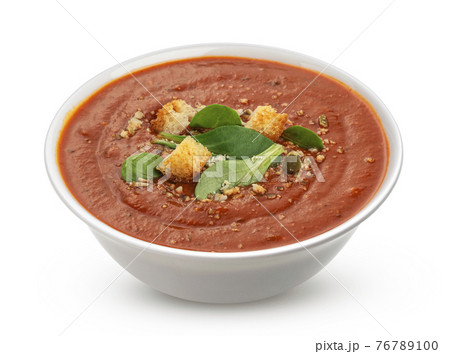 Bowl of tomato soup isolated on white background 76789100
