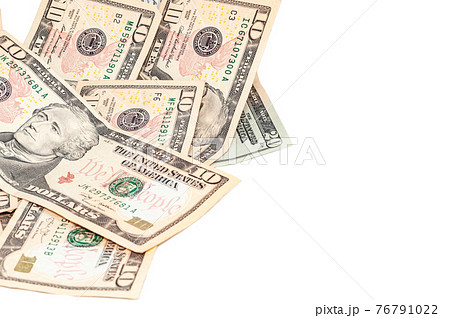 Cash payment, money close-up in denominations 20 and 10 US paper dollars isolated on white background, financial contribution Cash payment, money close-up in denominations 20 and 10 US paper dollars isolated on white background, financial contribution 76791022