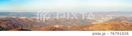 Mountain wilderness landscape, panorama forest-covered mountain range hills, nature Carpathians Ukraine, warm autumn day October. Mountain wilderness landscape, panorama forest-covered mountain range hills, nature Carpathians Ukraine, warm autumn day October. 76791026