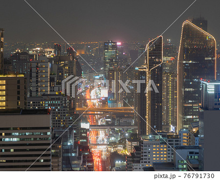 Aerial view of Bangkok Downtown Skyline, Thailand. Financial district and business centers in smart urban city in Asia. Skyscraper and high-rise buildings at night. 76791730