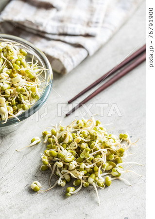Sprouted green mung beans. Mung sprouts. 76791900
