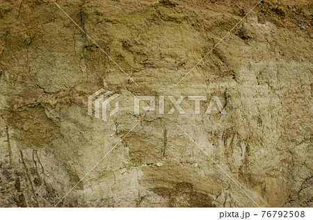 Natural background - vertical wall of sand in sand pit. Natural background - vertical wall of sand in sand pit. 76792508