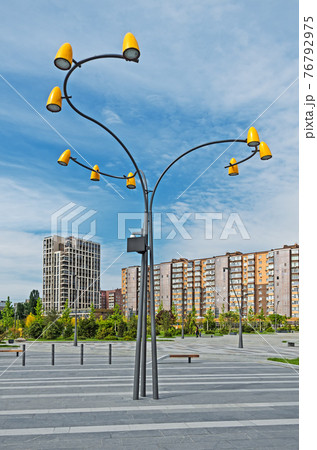 Street LED lamp in courtyard of multi-storey buildings Street LED lamp in courtyard of multi-storey buildings 76792975