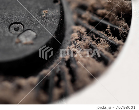 Cleaning dust from laptop cooler. Fixing notebook. Macro 76793001