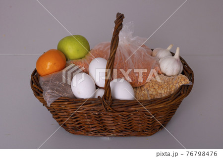 full of food basket. Horizontal composition, nobody full of food basket. Horizontal composition, nobody 76798476