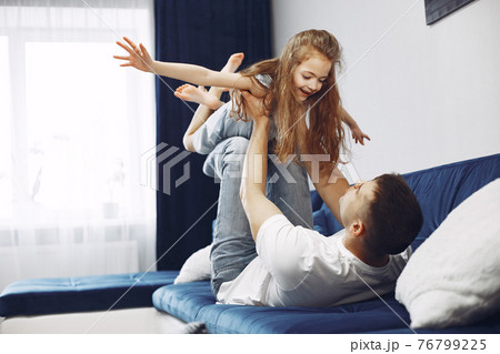 Daughter congratulates dad on father's day Daughter congratulates dad on father's day 76799225