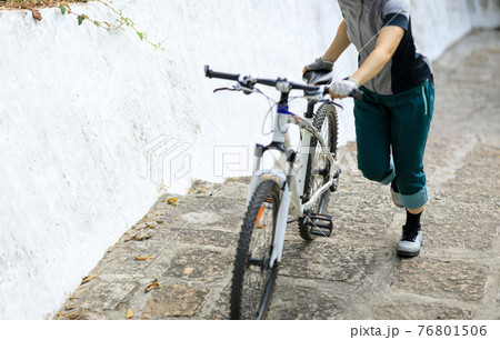 Successful woman looking at the view on high altitude mountain top 76801506