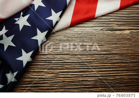 American USA Flag on wooden background American USA Flag on wooden background 76803875