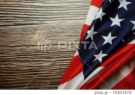 American USA Flag on wooden background 76803876