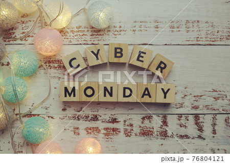 Cyber Monday alphabet letter and LED cotton balls on wooden background 76804121
