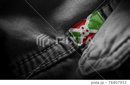 Tag on dark clothing in the form of the flag of the Burundi Tag on dark clothing in the form of the flag of the Burundi 76807952