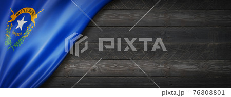 Nevada flag on black wood wall banner, USA Nevada flag on black wood wall banner, USA 76808801