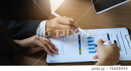 Fund managers researching and analysis Investment stock market. Business team consultation and discuss about analysis Investment stock market by paperwork. Fund managers researching and analysis Investment stock market. Business team consultation and discuss about analysis Investment stock market by paperwork. 76808994