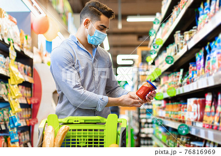Egyptian Man In Face Mask Buying Food In Supermarket Egyptian Man In Face Mask Buying Food In Supermarket 76816969