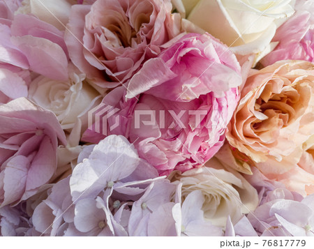 Gorgeous bouquet of roses and carnations with decorative dried flowers. 76817779
