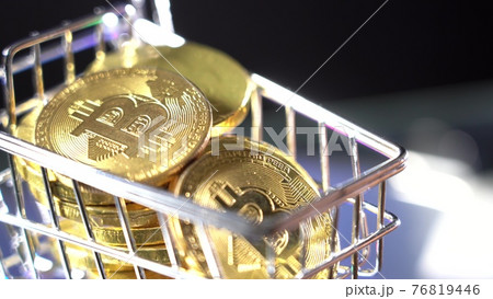 Bitcoins in the Cart. Concept: Purchase of Cryptocurrency 76819446
