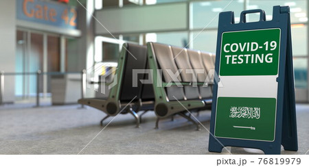 Flag of Saudi Arabia and COVID-19 testing text on a sandwich board sign in the airport. 3D rendering Flag of Saudi Arabia and COVID-19 testing text on a sandwich board sign in the airport. 3D rendering 76819979