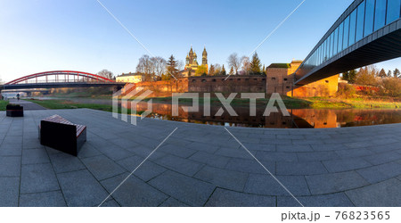 Poznan. Cathedral on Tumskiy Island at sunrise. Poznan. Cathedral on Tumskiy Island at sunrise. 76823565