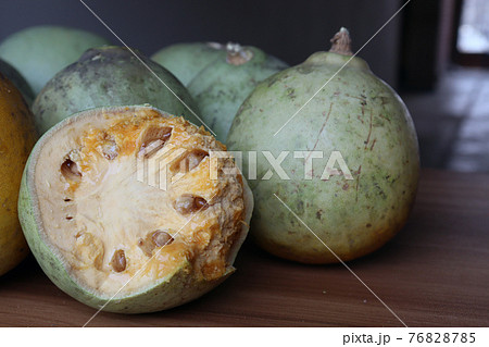 tasty and healthy ripe wood apple with juice 76828785