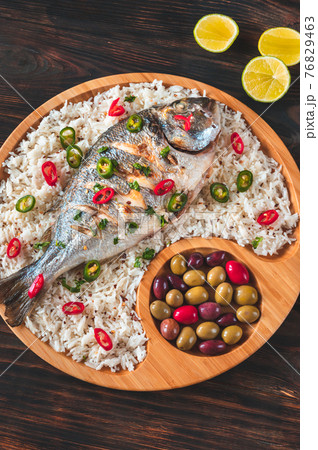 Grilled fish with rice Grilled fish with rice 76829463