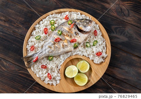 Grilled fish with rice Grilled fish with rice 76829465