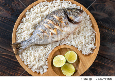 Grilled fish with rice Grilled fish with rice 76829466