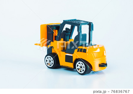 Construction vehicles and heavy machinery.Industrial vehicles yellow forklift. 76836767