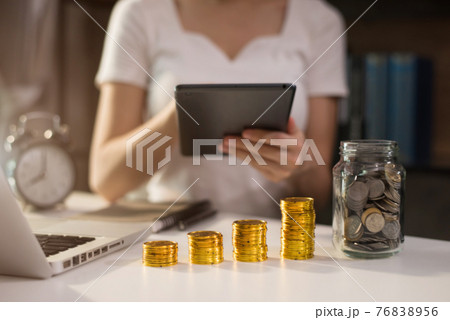 Business women are calculating daily expenses. Business women are calculating daily expenses. 76838956