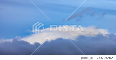 View of Puffy Clouds over the Canadian Mountain Landscape. View of Puffy Clouds over the Canadian Mountain Landscape. 76839262