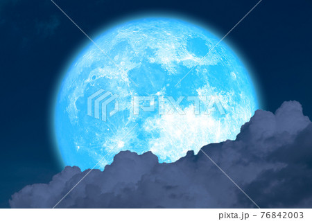 super flower blue moon rise back blur dark cloud on the night sky 76842003