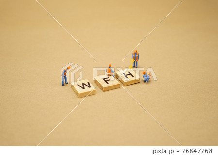 Work from home. Miniature people stay apart to reduce Covid 19 virus infection. Maintain social distance Detained, could not find anyone. using as background Healthcare concept and keep distance. 76847768