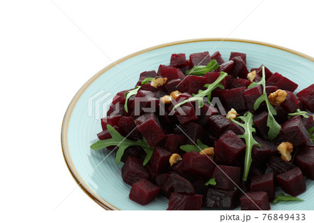 Plate with fresh beet salad isolated on white background 76849433
