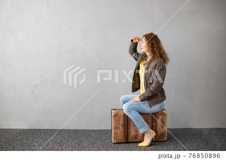 Young woman is ready to travel 76850896