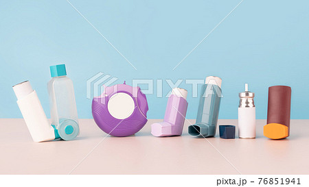 Set of asthma inhalers for asthma and COPD patients on table. Pharmaceutical product is used to treat lung inflammation and prevent asthma attack symptoms. Health care and medical concept. Copy space. Set of asthma inhalers for asthma and COPD patients on table. Pharmaceutical product is used to treat lung inflammation and prevent asthma attack symptoms. Health care and medical concept. Copy space. 76851941