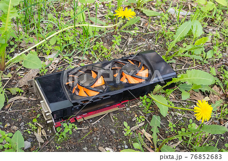 Broken graphics card after bitcoin mining, dumped in a landfill Broken graphics card after bitcoin mining, dumped in a landfill 76852683