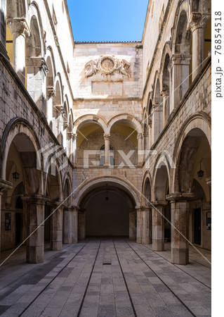 Stone arches decorate the Sponza palace inside the old town of Dubrovnik Croatia 76854518