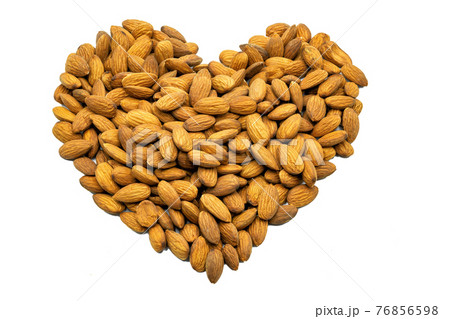 A heart made up of almonds. Subject on a white background. A heart made up of almonds. Subject on a white background. 76856598