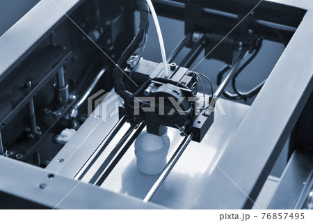 Objects printed by 3d printer. Automatic three dimensional 3d printer performs Objects printed by 3d printer. Automatic three dimensional 3d printer performs 76857495