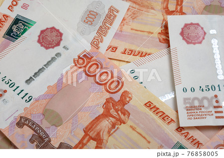 5000 rubles background. Russian banknotes at different angles. 76858005