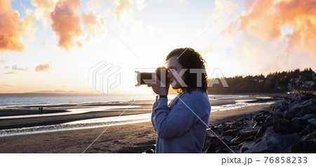 Adventure Travel Photographer at West Pacific Ocean Coast. Adventure Travel Photographer at West Pacific Ocean Coast. 76858233