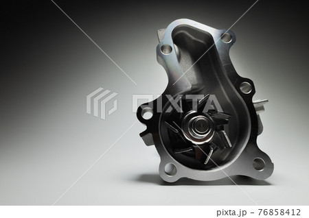 Water pump of the internal combustion engine cooling system. Contrasting on a gray gradient 76858412
